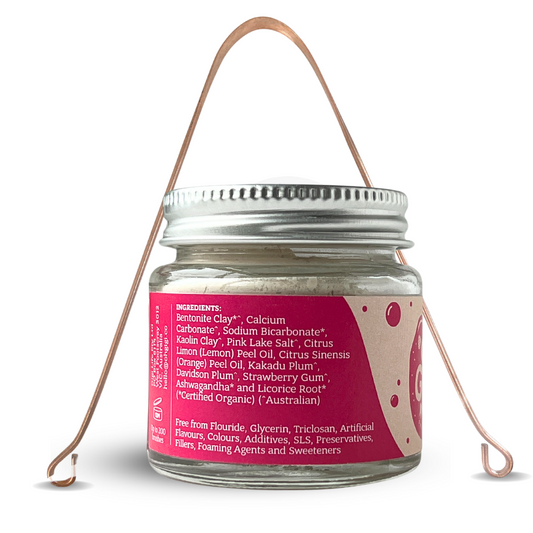 ohGiGi non tox organic toothpowder fruity and tongue scraper back view